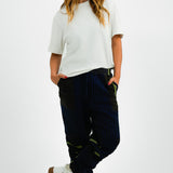 Ivy ParkAdidas Originals x Ivy Park Dog Tooth Joggers In Blue With Green Detail