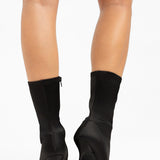 ASOS DESIGN Empress Heeled Bow Embellished Sock Boots In Black