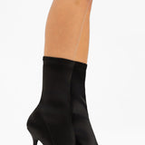 ASOS DESIGN Empress Heeled Bow Embellished Sock Boots In Black