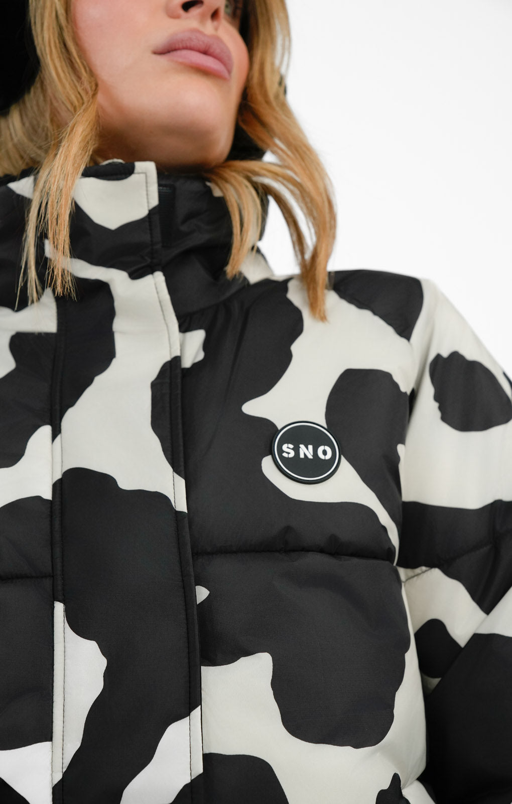 Cow print puffer jacket on sale